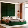 A bedroom scene featuring a large, upholstered headboard and a bed. Anteprima dell’immagine prodotto