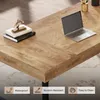 A close-up view of a wooden desk with a laptop, books, and a decorative horse figurine. Voir les images du produit