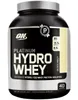 A product shot of a tub of protein powder. Voir les images du produit