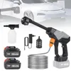 A collection of items for a cordless pressure washer, including the main unit, batteries, hose, charger, and attachments, with a blurred car in the background. Produktbild-Vorschau