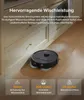 A black robot vacuum cleaner is shown on a wooden floor next to kitchen cabinets, with text overlays describing its features. Produktbild-Vorschau