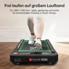 A person is walking on a treadmill in a room. Produktbild-Vorschau