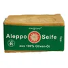 A bar of Aleppo soap with a green label. Produktbild-Vorschau