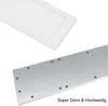 A close-up view of a white LED panel light and a metal mounting plate with screws. Anteprima dell’immagine prodotto