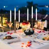 A romantic dinner setting with candles, food, and drinks. Produktbild-Vorschau