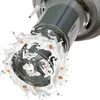 A close-up of a machine processing milk and almonds, creating a splash effect. Produktbild-Vorschau