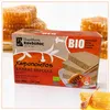 Kandylas Bio Halva mit Honig 400 g mit Honigwaben im Hintergrund Produktbild-Vorschau
