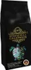 A black coffee bag with gold lettering and a colorful turtle illustration. Produktbild-Vorschau