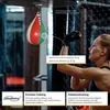 A woman is training with a speed bag in a gym. Produktbild-Vorschau