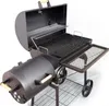 A black charcoal grill with a side smoker attachment, shown outdoors against a white background. Podgląd zdjęcia produktu