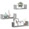 Three concrete-look shelves with decorative items. Náhľad obrázku produktu