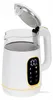 A white electric kettle with gold accents and a digital display is shown against a white background. The lid is open. Produktbild-Vorschau
