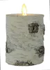 A close-up of a birch bark LED candle. Produktbild-Vorschau