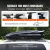 A car roof box mounted on a car roof rack, with instructional graphics and text about crossbar compatibility. Voir les images du produit