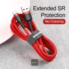 A red braided USB-C charging cable is coiled on a textured gray surface, with a white bowl partially visible on the left. Text overlays highlight product features. Produktbild-Vorschau