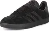 A black Adidas Gazelle sneaker is shown from a side angle against a white background. Voir les images du produit