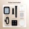 A flat lay image showing the contents of a product package, including a smartwatch, watch bands, charging cable, user manual, and other accessories. Náhled obrázku produktu