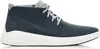 A side view of a blue Timberland shoe with a white sole. Produktbild-Vorschau