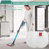 A woman is vacuuming a carpeted floor in a modern home. Produktbild-Vorschau
