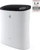 A white and black air purifier is shown against a white background. A small rating badge is visible in the top right corner. Podgląd zdjęcia produktu