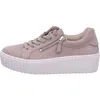 A side view of a beige women's sneaker with a white platform sole. Produktbild-Vorschau
