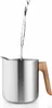 Water being poured into a stainless steel teapot with a wooden handle. Náhled obrázku produktu