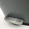 A close-up view of the pedal of a gray trash can with the brand name 'Spirella' embossed on it. Anteprima dell’immagine prodotto