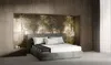 A bedroom scene with a cutaway mattress on a bed. Produktbild-Vorschau