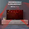 A television set is displayed on a stand, with abstract red wave-like graphics overlaying the image. Produktbild-Vorschau
