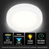 A round LED ceiling light with informational icons below. Náhľad obrázku produktu