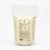 A resealable pouch of vegan protein powder with a label showing nutritional information. Produktbild-Vorschau