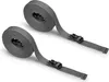 Two rolled-up gray straps with black buckles on a white background. Produktbild-Vorschau