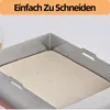 A close-up view of a tofu press with a beige liner inside a metal frame. Produktbild-Vorschau