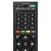 A close-up view of a black remote control with various buttons. Produktbild-Vorschau