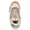 A top-down view of a beige and brown Buffalo sneaker with white sherpa lining. Podgląd zdjęcia produktu