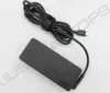 A black laptop power adapter with a coiled cable and a USB-C connector. Produktbild-Vorschau