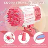 Rosa-weiße Bazooka-Blaspistole in einer Hand gehalten, erzeugt viele Blasen, mit Funktionsbeschriftungen Anteprima dell’immagine prodotto
