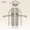 A pair of silver door handles are displayed against a cream and white background with decorative arches and text. Produktbild-Vorschau