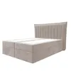 A beige upholstered box spring bed with a fluted headboard, shown from a side-angle on a white background. Produktbild-Vorschau