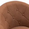 A close-up shot of the tufted upholstery of a brown armchair. Produktbild-Vorschau