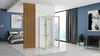 A modern open-plan bathroom and bedroom with a shower cabin, bed, and artwork. Produktbild-Vorschau