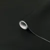 A roll of black matte self-adhesive film is shown diagonally against a black background. Náhľad obrázku produktu