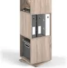 A tall, narrow, rotating shelving unit with a wood-grain finish, filled with office supplies like binders and a box. Náhled obrázku produktu