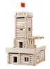 A wooden toy castle made of logs, with a red flag on top. Anteprima dell’immagine prodotto