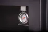 A close-up of a thermometer attached to a black surface. Produktbild-Vorschau