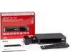 A product shot of a satellite receiver and its accessories, including the box, power adapter, remote control, and manual, arranged on a white background. Produktbild-Vorschau