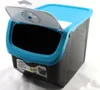 A blue and black storage box with its lid open, shown against a white background. Produktbild-Vorschau