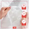 A person's hands are holding open a white pillow, revealing its fluffy filling. There are marketing icons and text overlays on the right side of the image. Produktbild-Vorschau