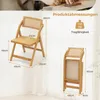 A collage showing a wooden folding chair with rattan detailing, both open and folded, with product dimensions and weight capacity indicated. Podgląd zdjęcia produktu