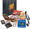 A collection of One Piece themed merchandise, including a box, socks, a sleep mask, a lanyard, stickers, and other small items, arranged around the box. Produktbild-Vorschau